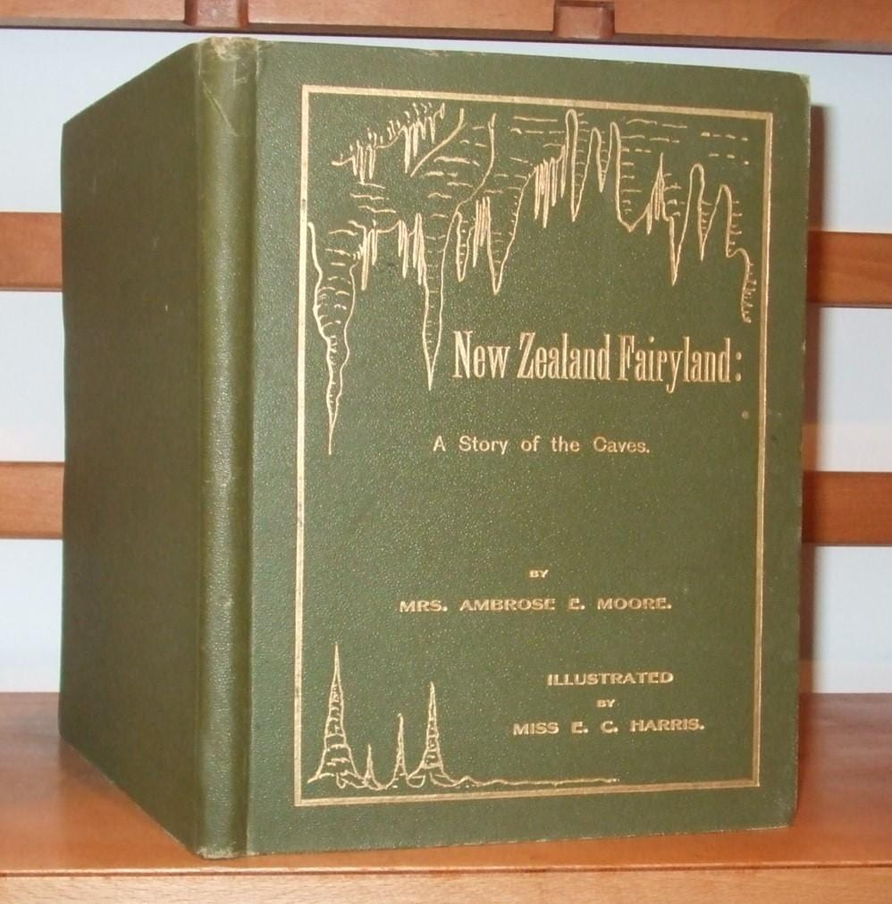 Olive green cover with gold lettering, featuring silhouettes of stalactites