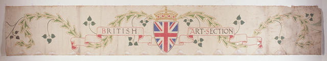 A six metre long section of frieze from the British oil painting gallery at the New Zealand International Exhibition, held in Christchurch, 1906-7. In the centre is a shield with the Union Jack in colour. A scroll runs to the left and right-hand sides of the shield and contains the words "British Art Section'. Green vines with stylised leaves radiate out from the shield on both sides, in a symmetrical panel.